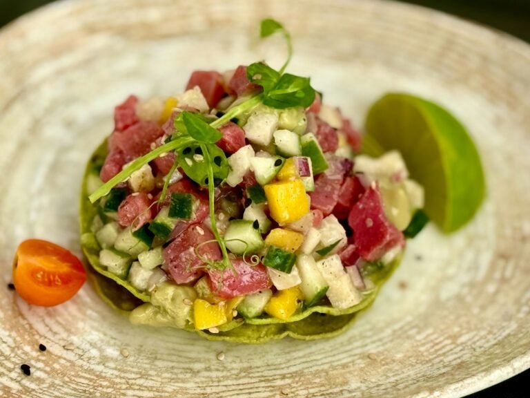 Seafood tostada with tuna and mango